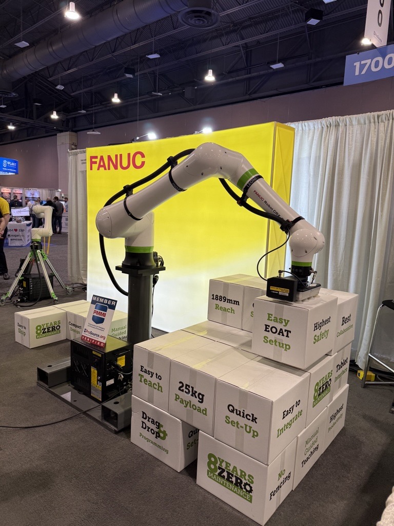 Industrial cobot arm showcasing payload and programming features
